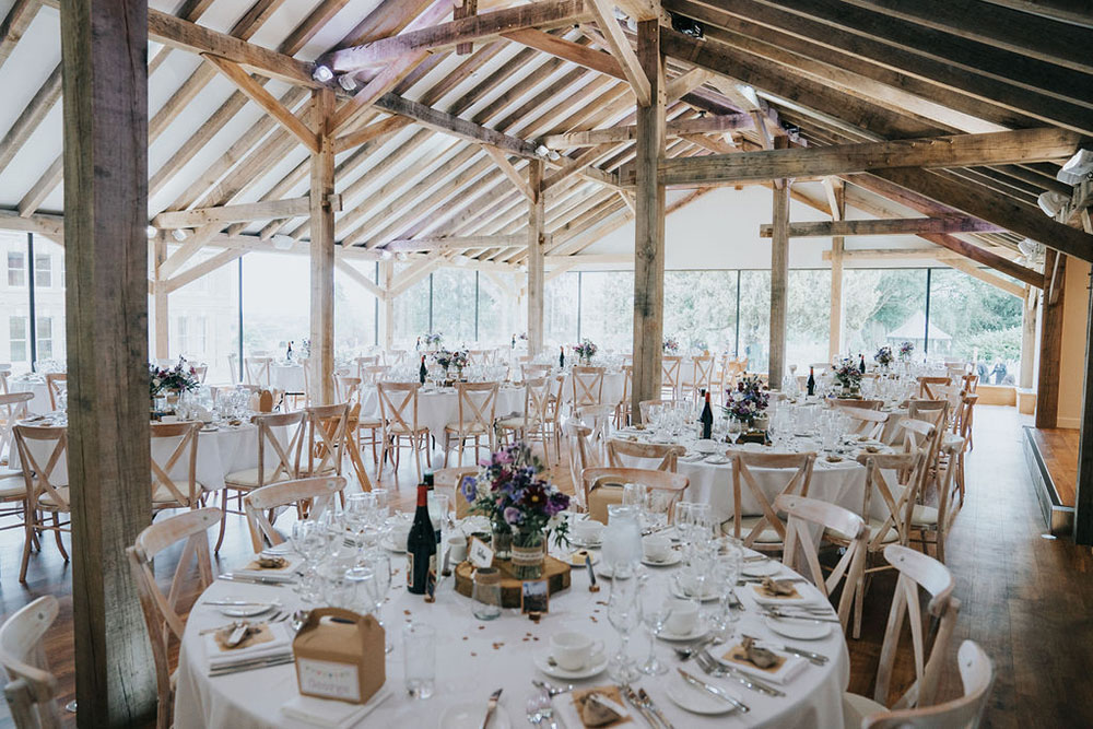 Wedding breakfast feast set up in Oak Barn at Bredenbury Court Barns