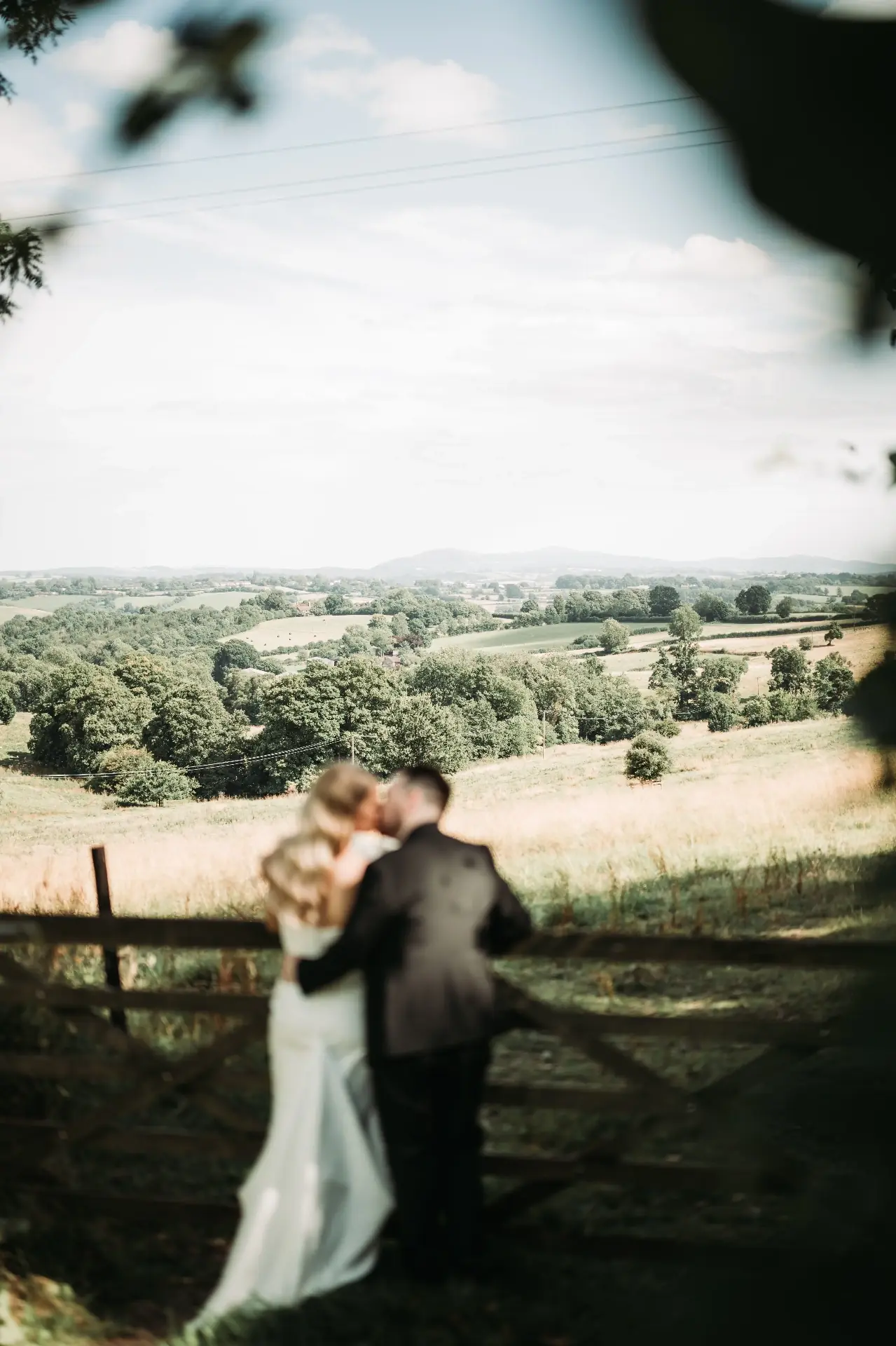 Couple overlooking the Herefordshire countryside at Bredenbury Court Barns